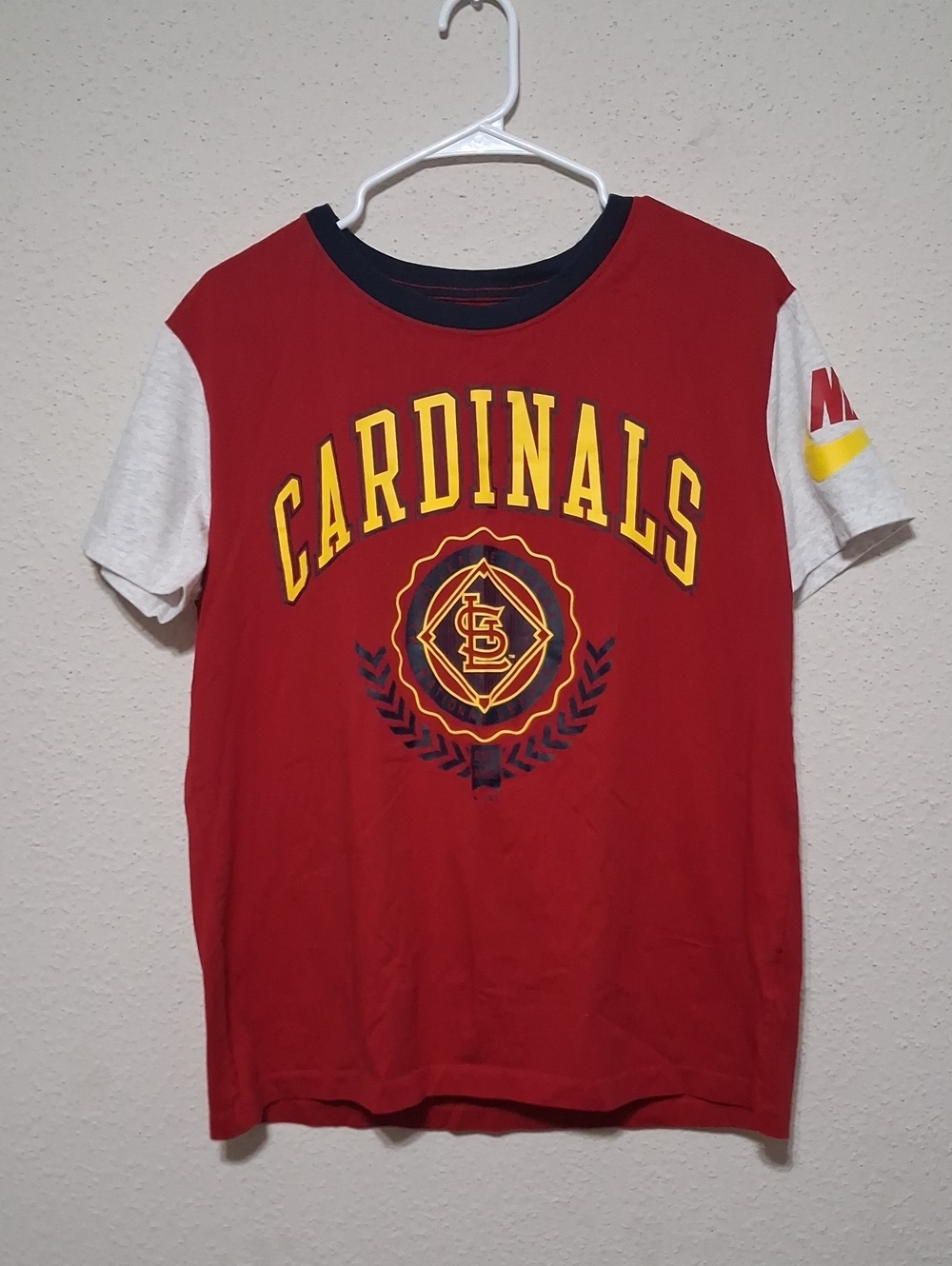 Nike Cardinals Short Sleeve Tee in Red with White Sleeves and Yellow Graphic